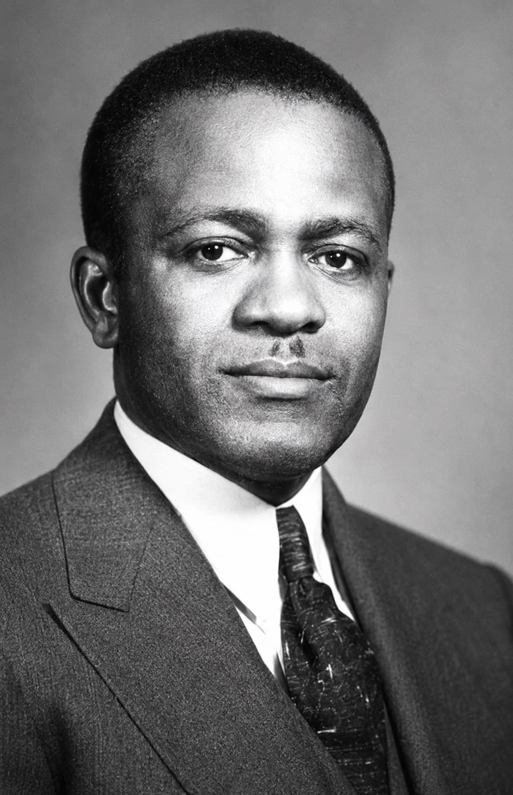 Black-and-white studio portrait of Attorney Benjamin F. Wilson in a pinstriped suit and patterned tie